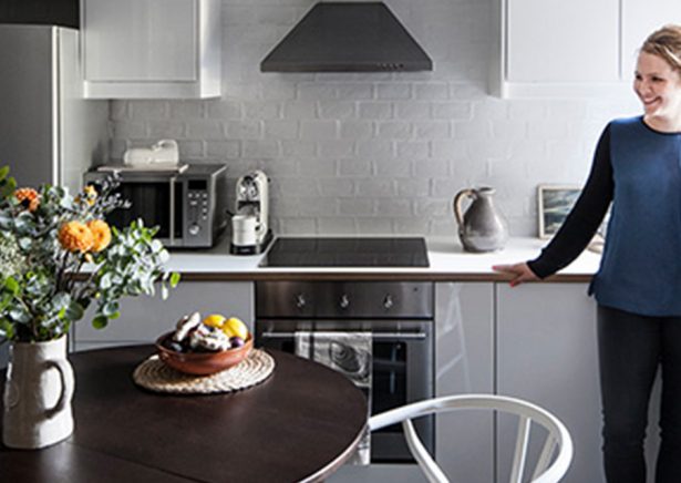 Lucy gough photographer in her own grey and chrome style kitchen interior